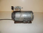 Gast 1EMA-24-M100X Pump (SQS48). Fixed Price $37.50.