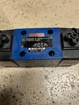 New Old Stock Rexroth Directional Solenoid Valve 4WE J33/CW110N9K4 R900592338. Fixed Price $475.00.