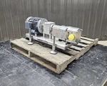 Used Unibloc Rotary Lobe Pump, Model PD450, 3 Hp. Fixed Price $7500.00.