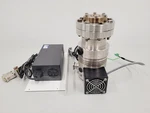Boc Edwards EXT75DX Turbomolecular Pump With Cooler And 24V Power Supply Tmp. Fixed Price $2547.13.