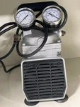 Gast DOA-P704-AA High-capacity Vacuum Pump, With Gauge, Regulator, And Relief. Fixed Price $750.00.